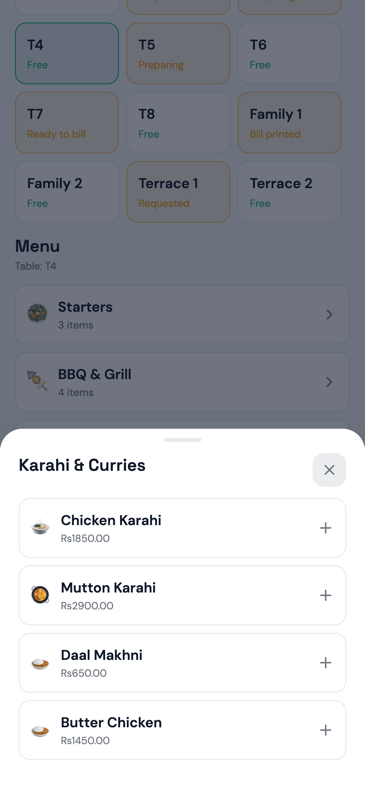 Tables on the TapNtrade mobile app: Waiters take orders at the table.